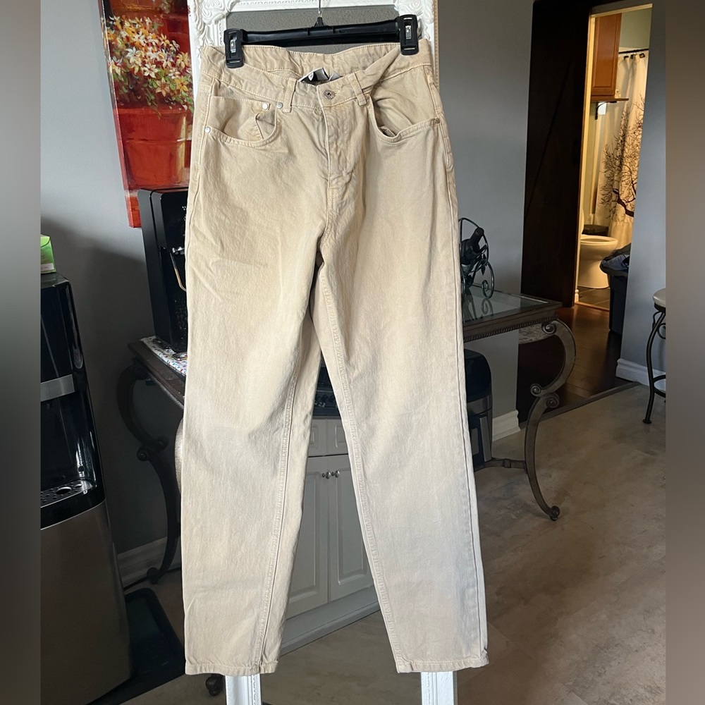The Ragged Priest beige jeans.